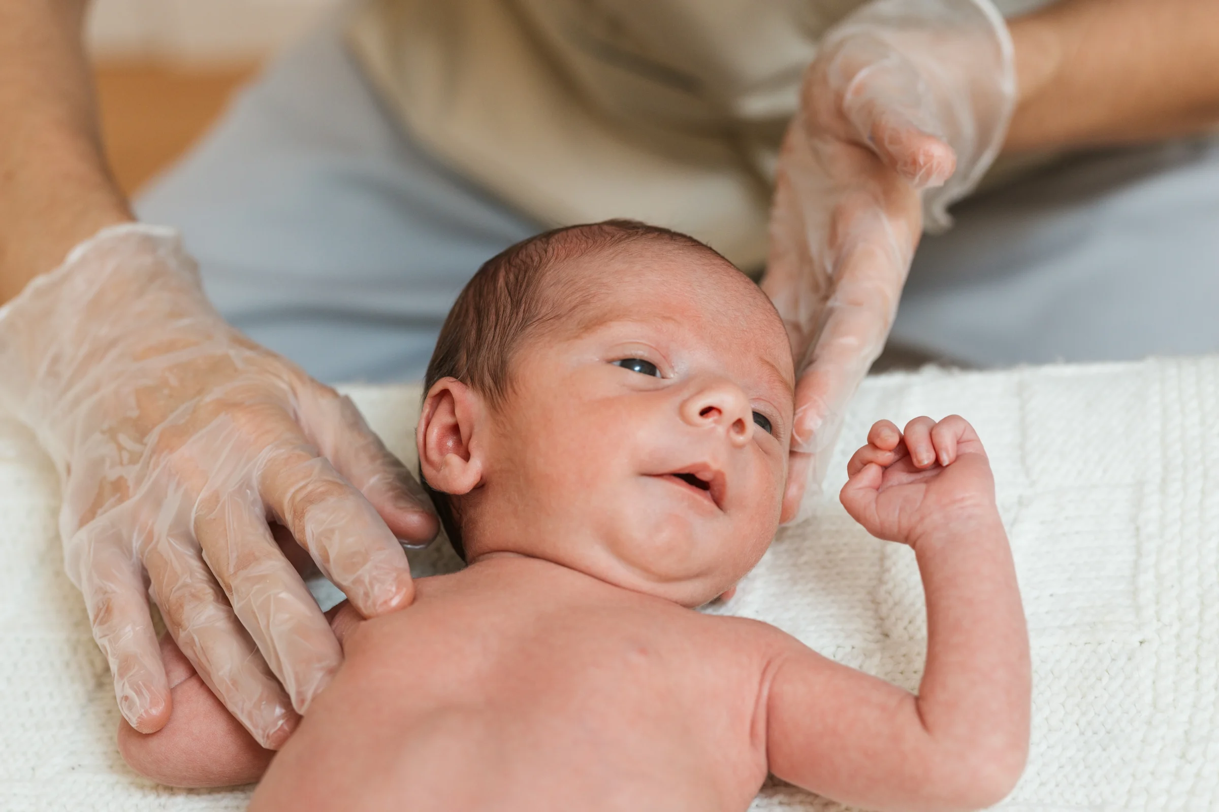 Traumatic Delivery 3 close up view of a little baby receiving a treatme 2025 01 09 05 52 19 utc